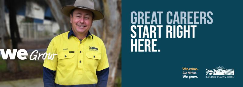 Image of a staff member wearing high vis with the words "we grow"